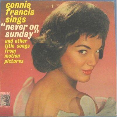 Album cover art for Sings Never on Sunday and Other Title Songs from Motion Pictures