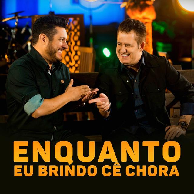 Album cover art for Enquanto Eu Brindo Cê Chora